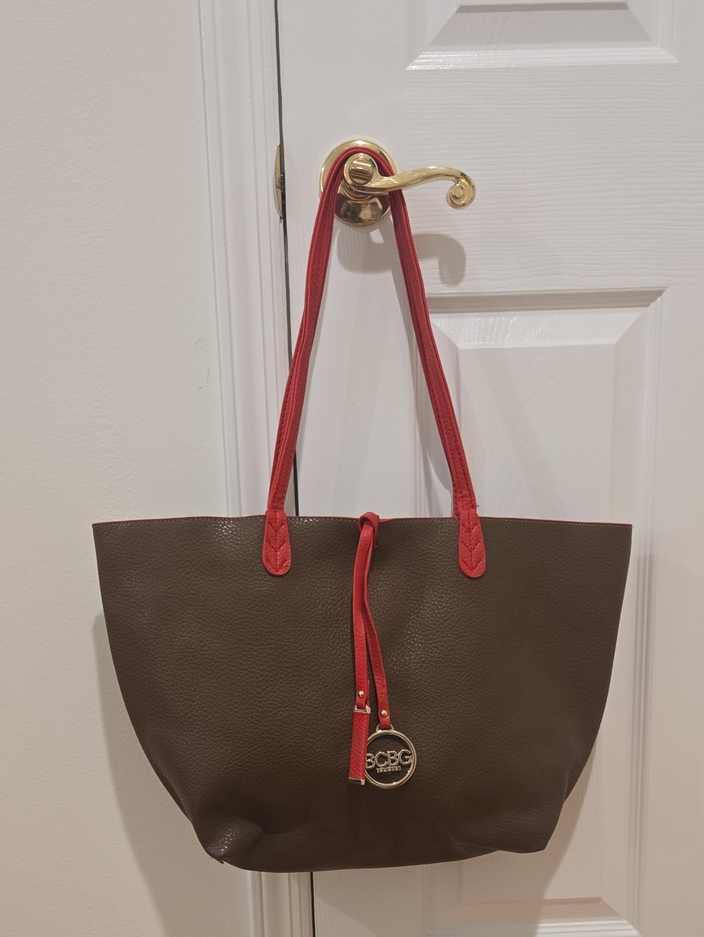 BCBG Reversible Brown & Red Tote With Logo Charm